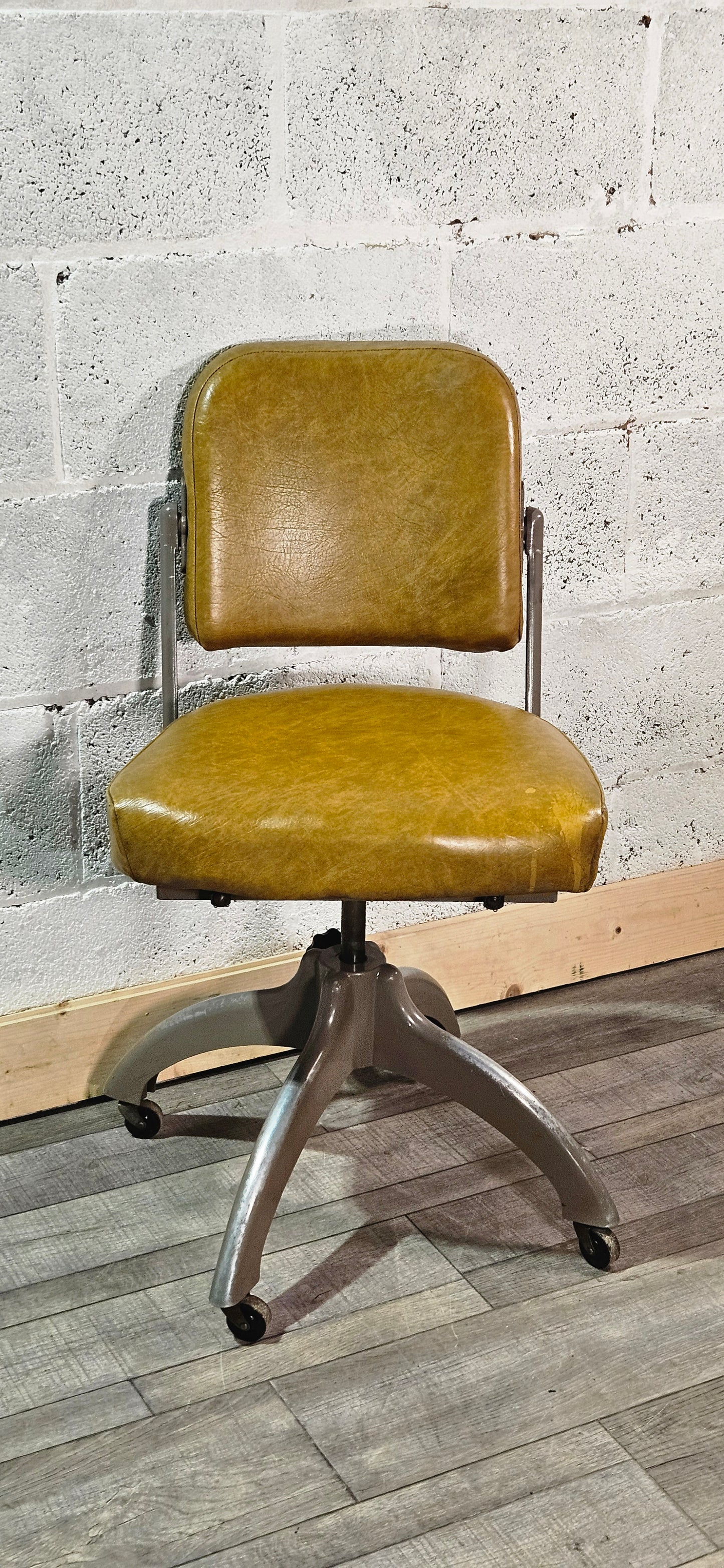 Mid century TanSad adjustable machinists chair.