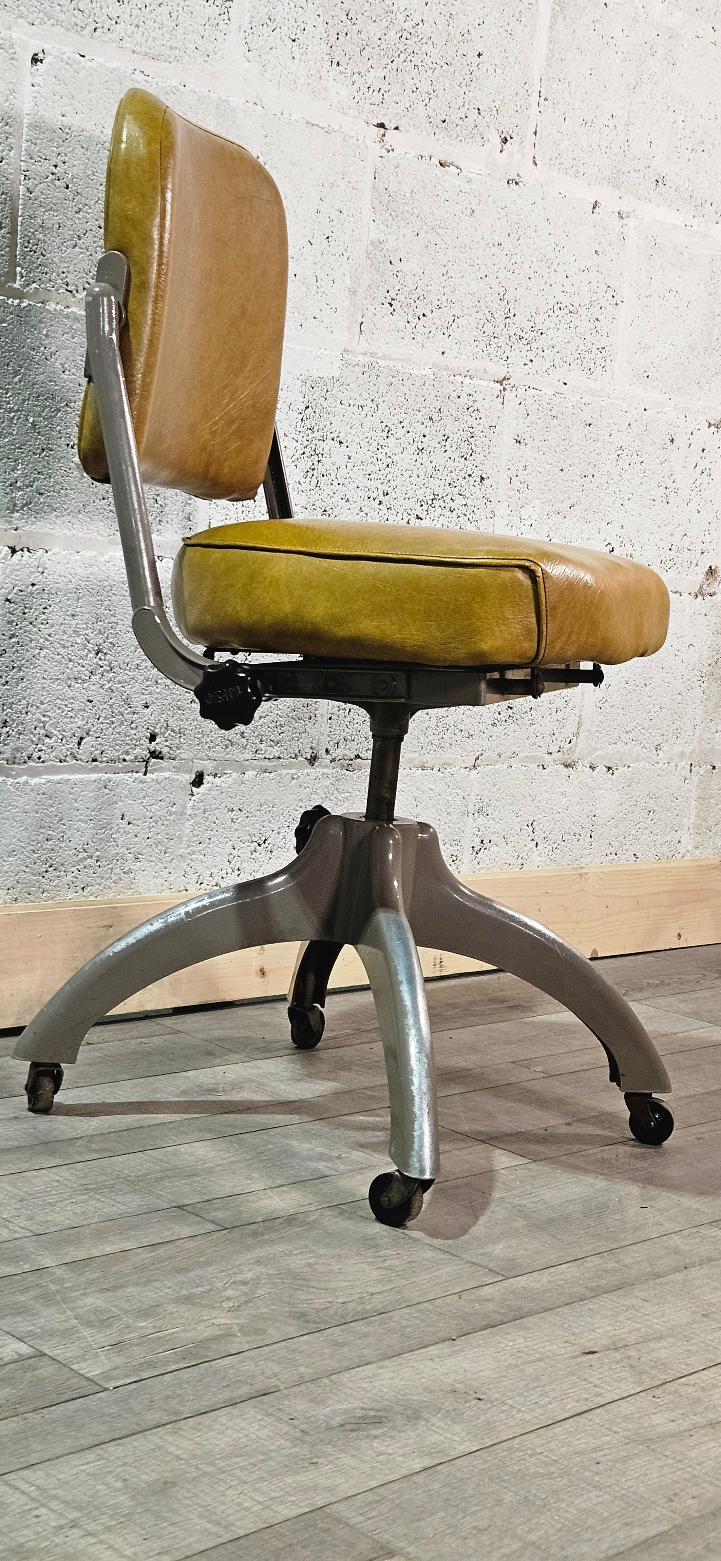 Mid century TanSad adjustable machinists chair.