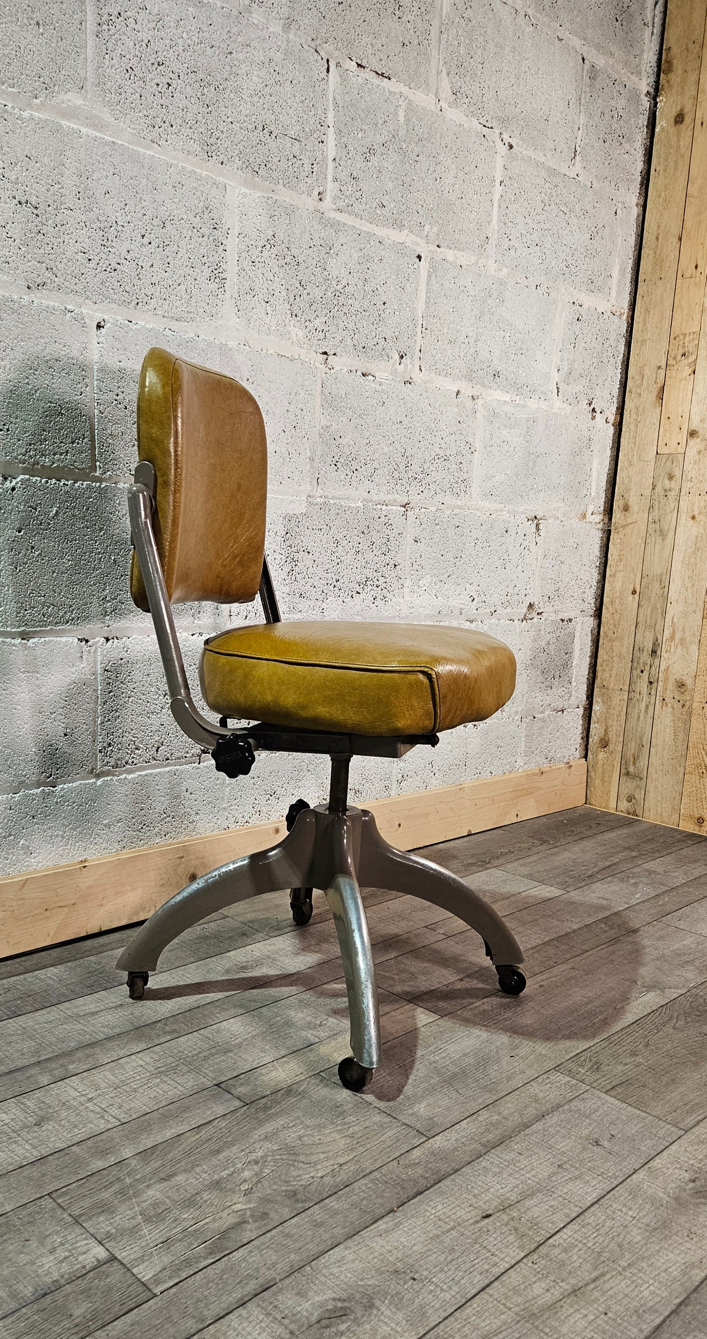 Mid century TanSad adjustable machinists chair.