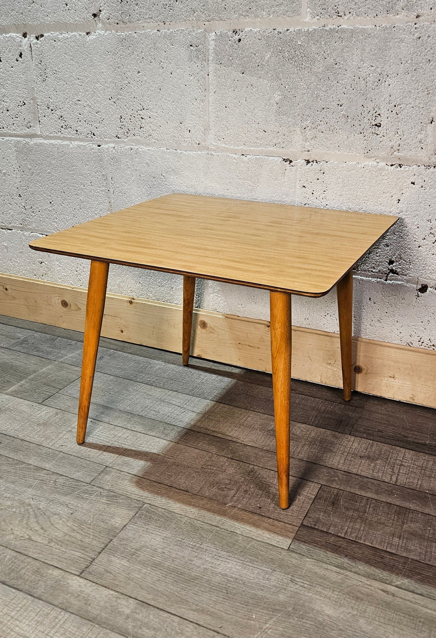 Mid century plywood and formica top coffee table.