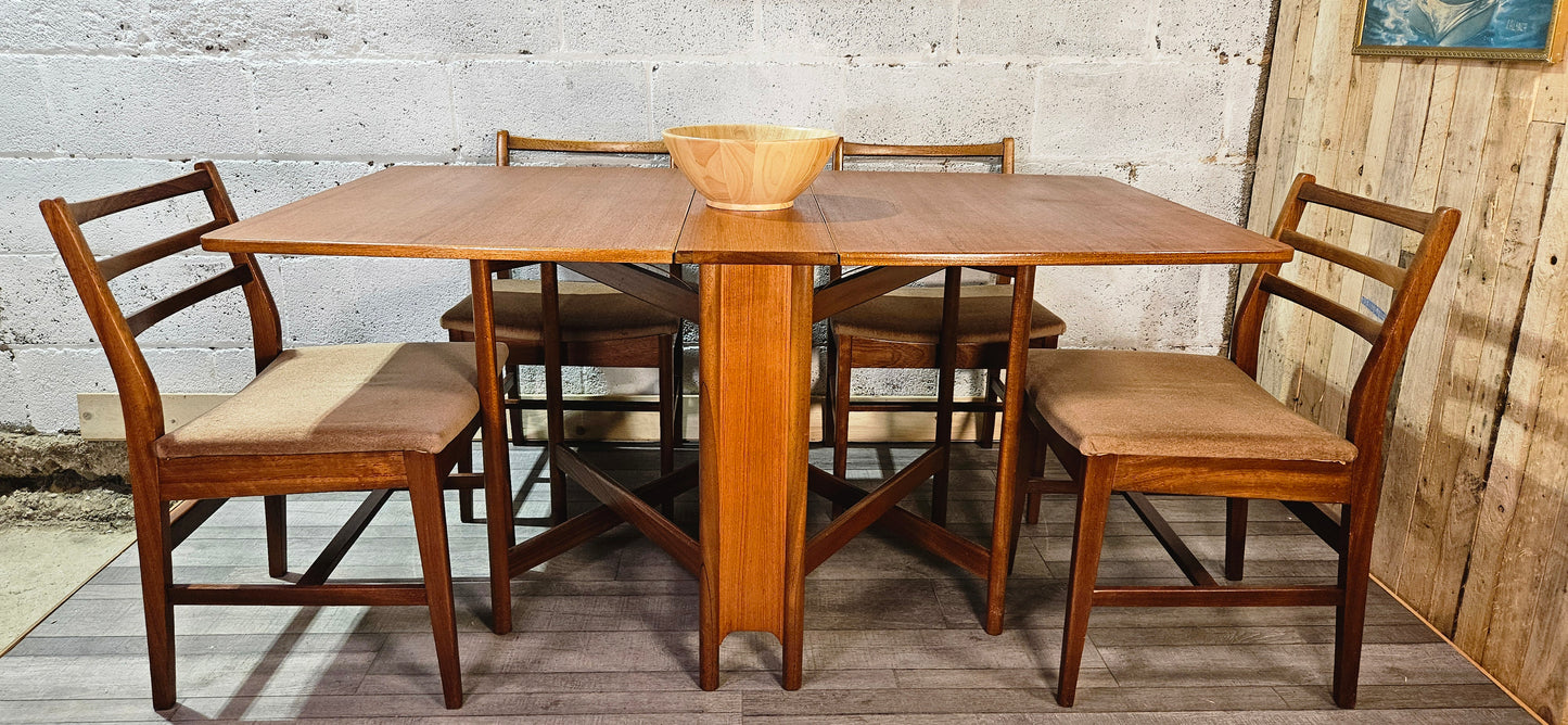 Mid century teak McIntosh drop leaf table and 4 teak chairs.