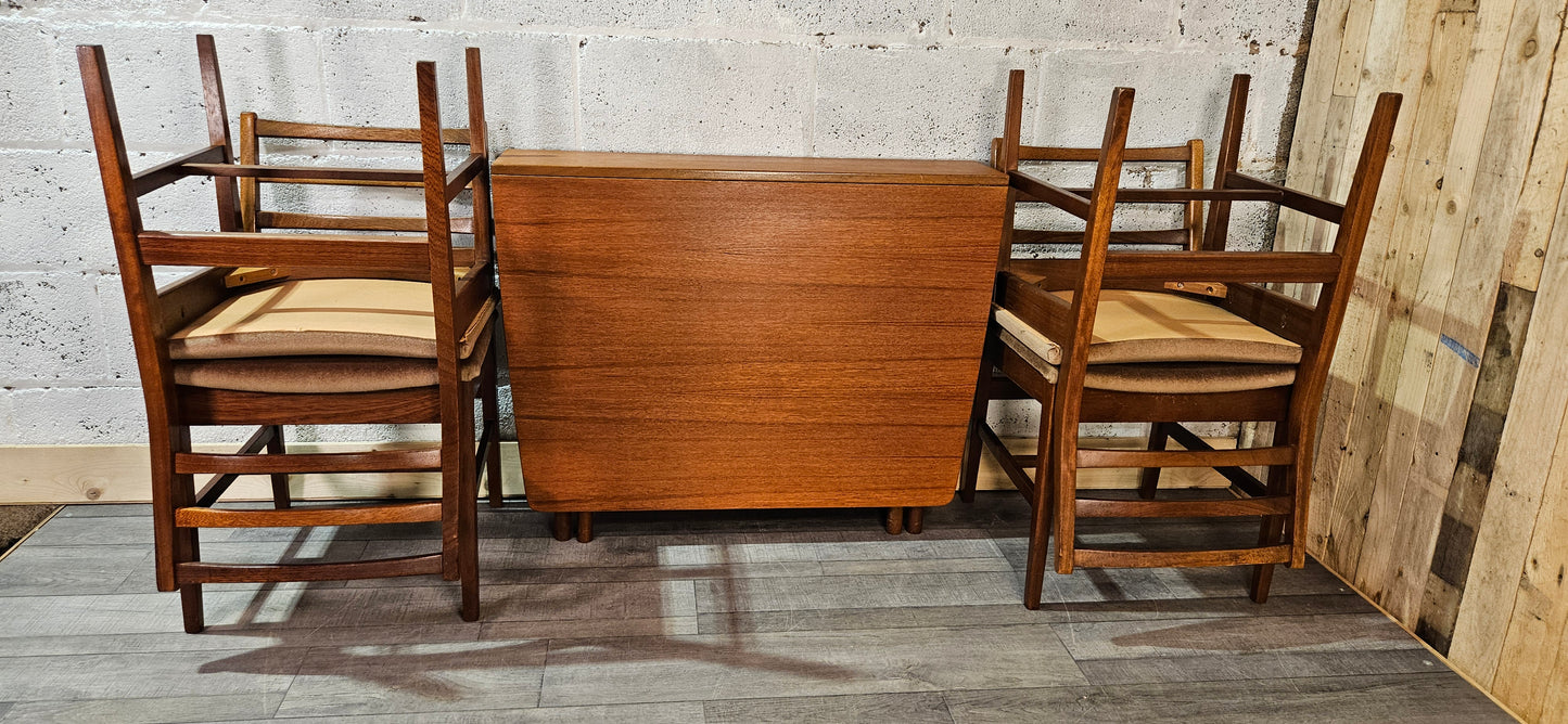 Mid century teak McIntosh drop leaf table and 4 teak chairs.