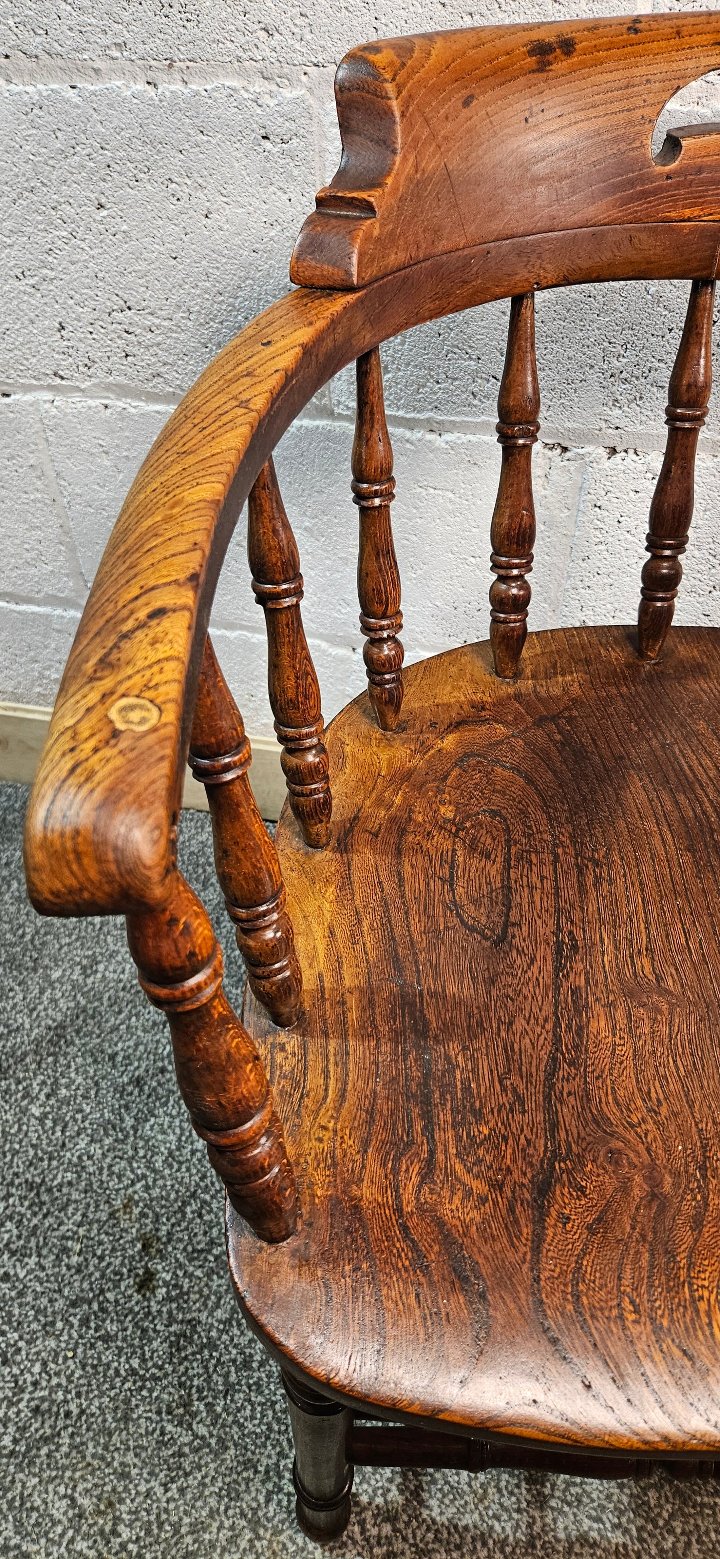 Early 1900s Elm captains chair.