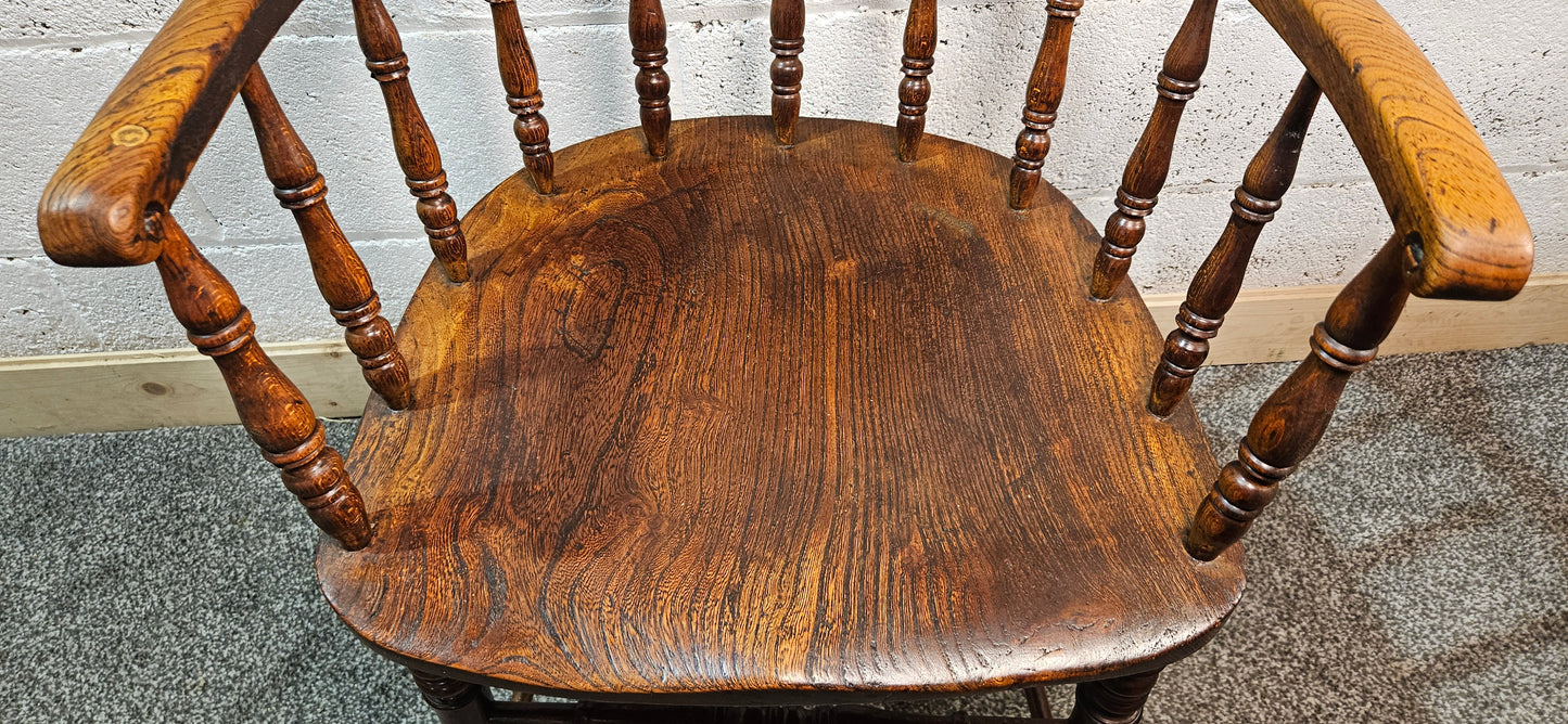 Early 1900s Elm captains chair.