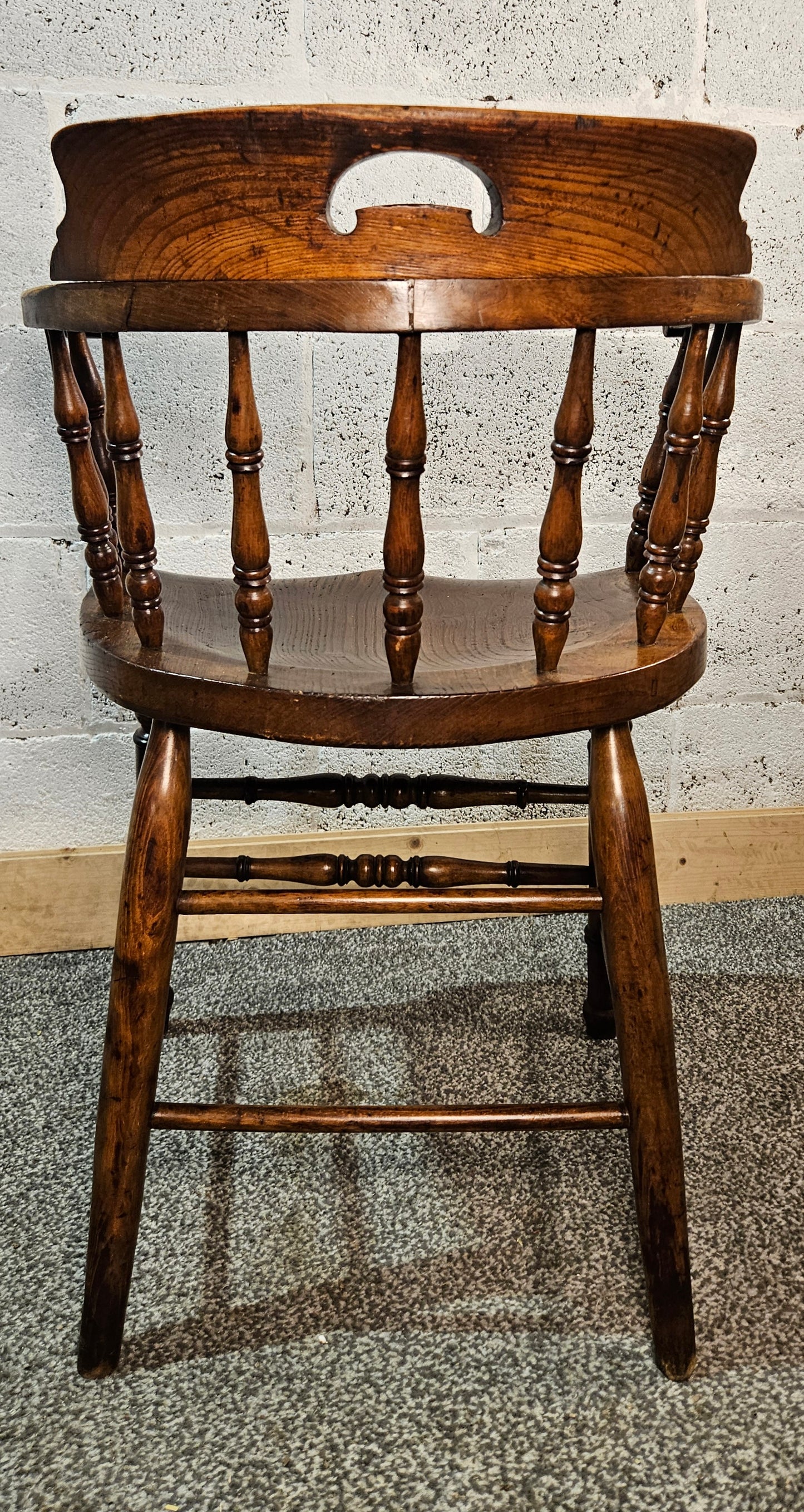 Early 1900s Elm captains chair.