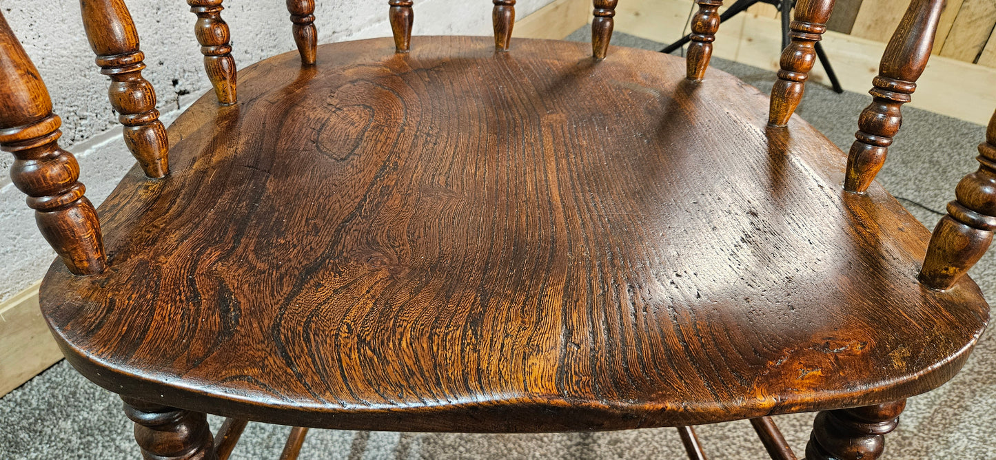 Early 1900s Elm captains chair.