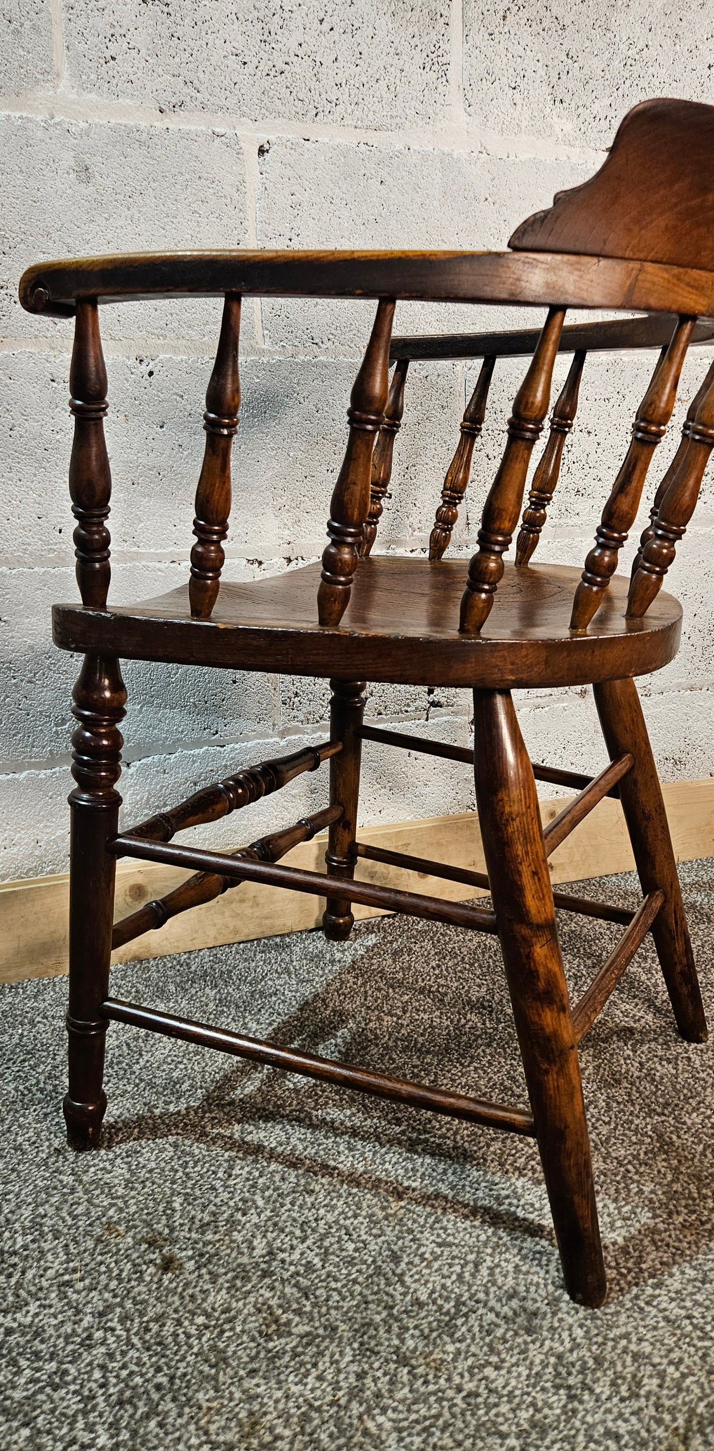 Early 1900s Elm captains chair.